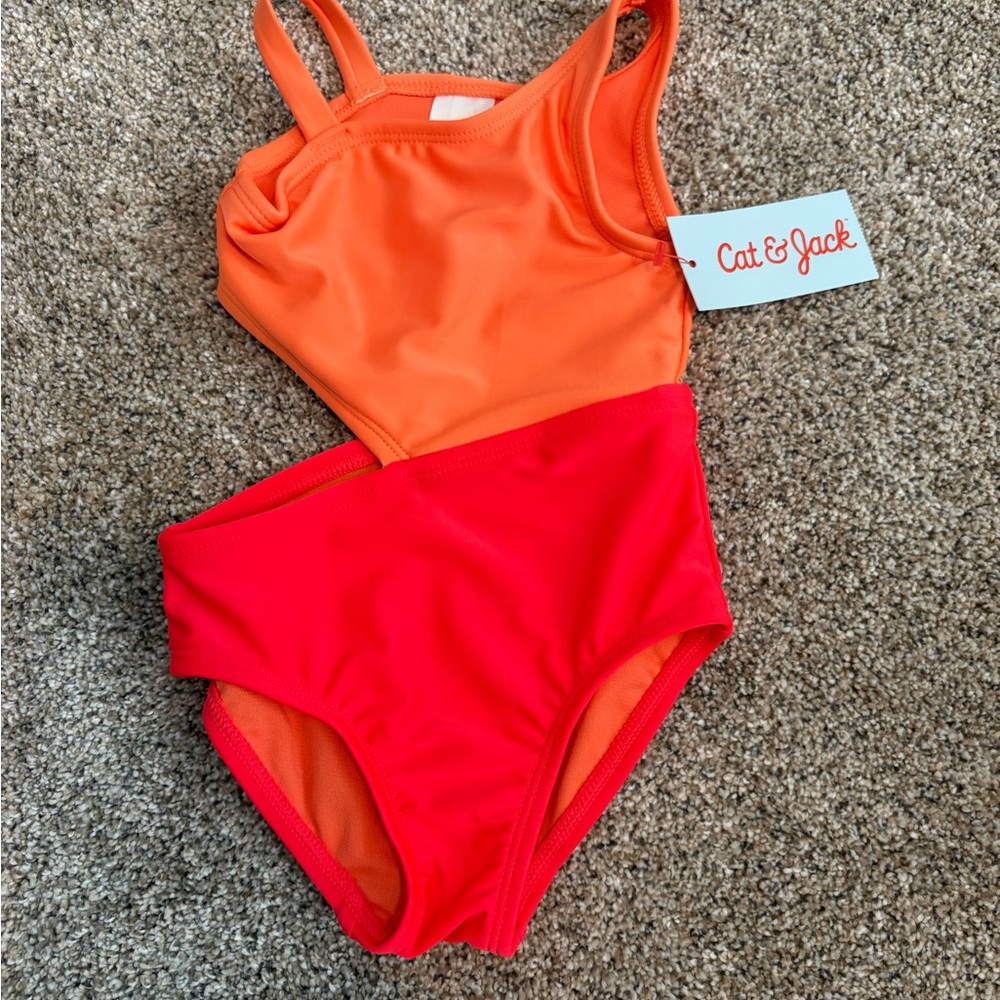 3 swimsuits in batch total- 2 Cat & Jack Kids' Swimsuit and 1 swim top